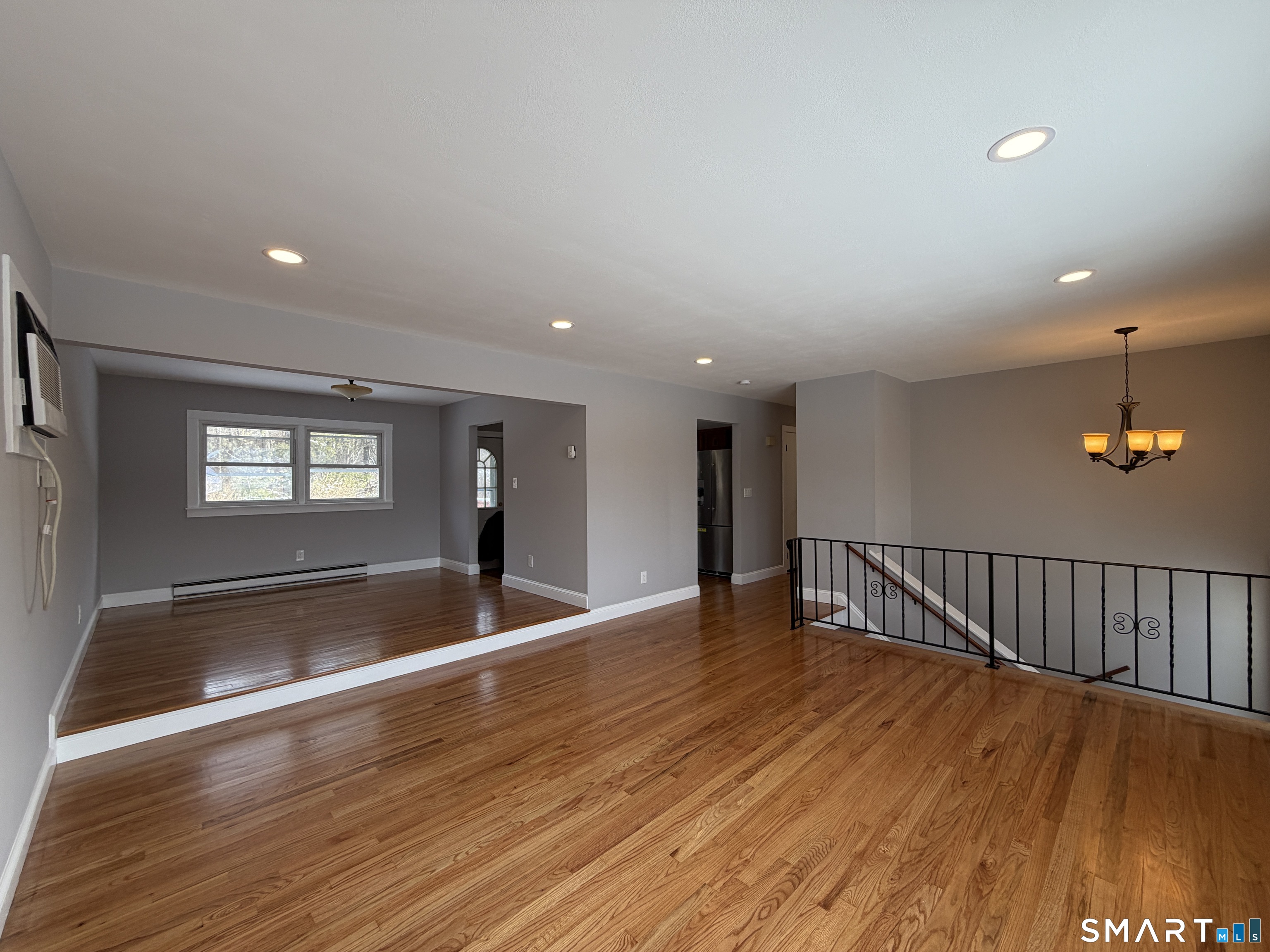 131 Pocono Road Brookfield, CT 06804 - Photo 17 of 27 a view of a room with wooden floor and window