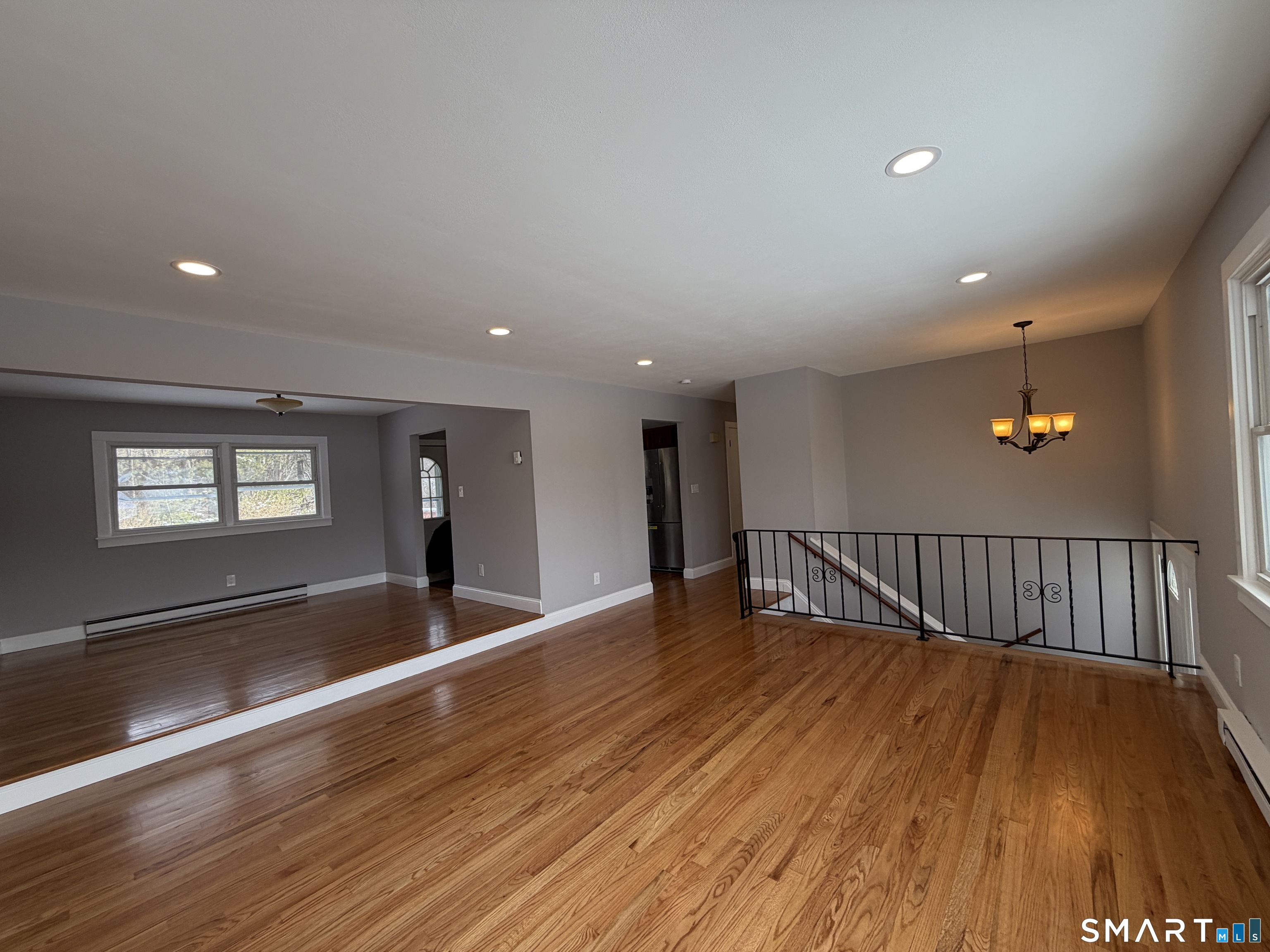 131 Pocono Road Brookfield, CT 06804 - Photo 4 of 27 a view of a hallway with wooden floor