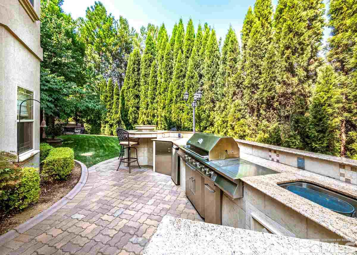 39 Sawbuck Road Reno, NV 89519 - Photo 18 of 23 a view of a chairs and table in the patio