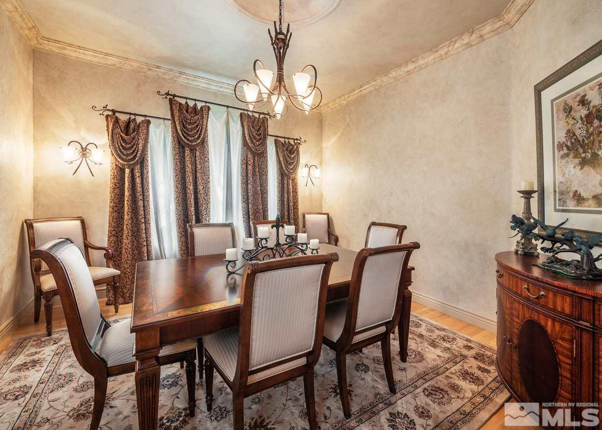 39 Sawbuck Road Reno, NV 89519 - Photo 5 of 23 a view of a dining room with furniture and chandelier