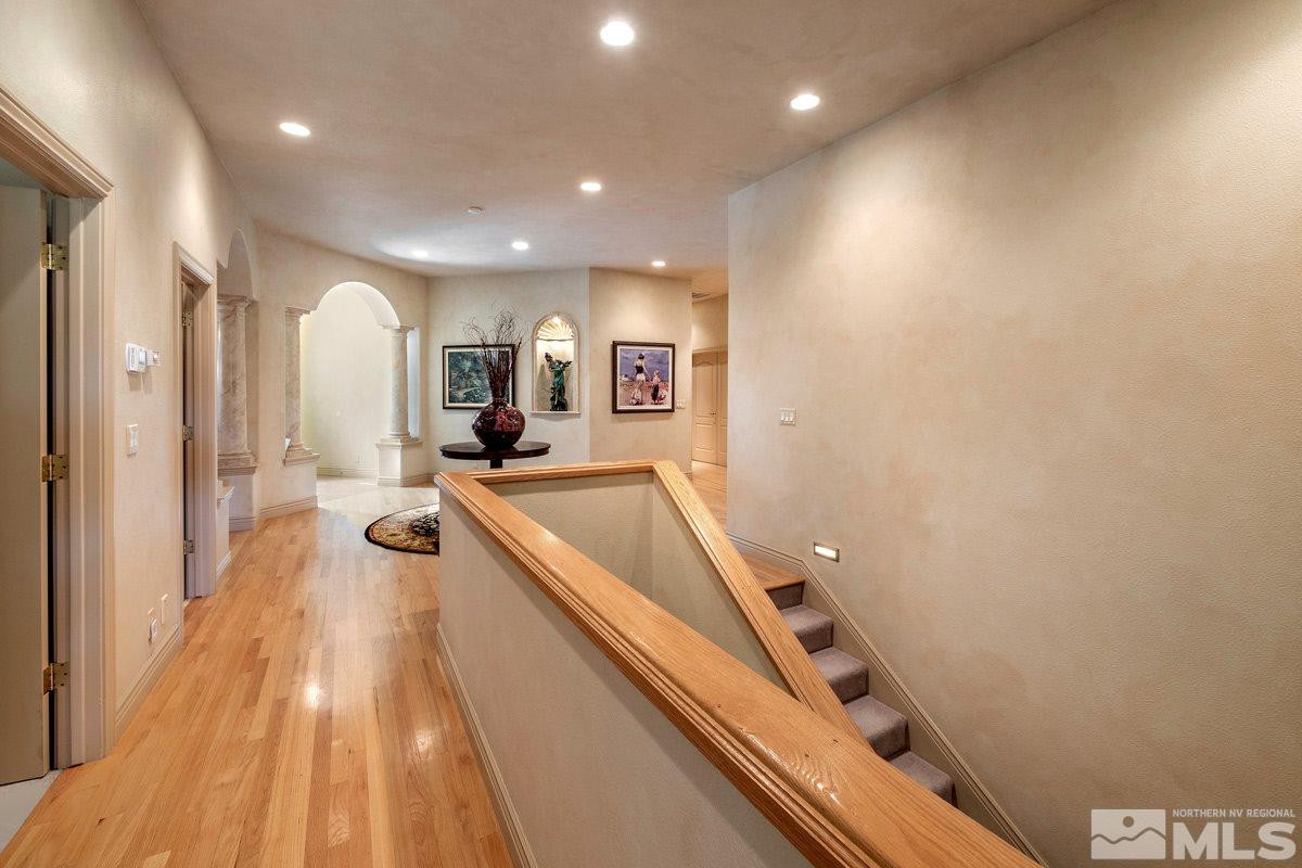 39 Sawbuck Road Reno, NV 89519 - Photo 6 of 23 a view of a big room with wooden floor and furniture
