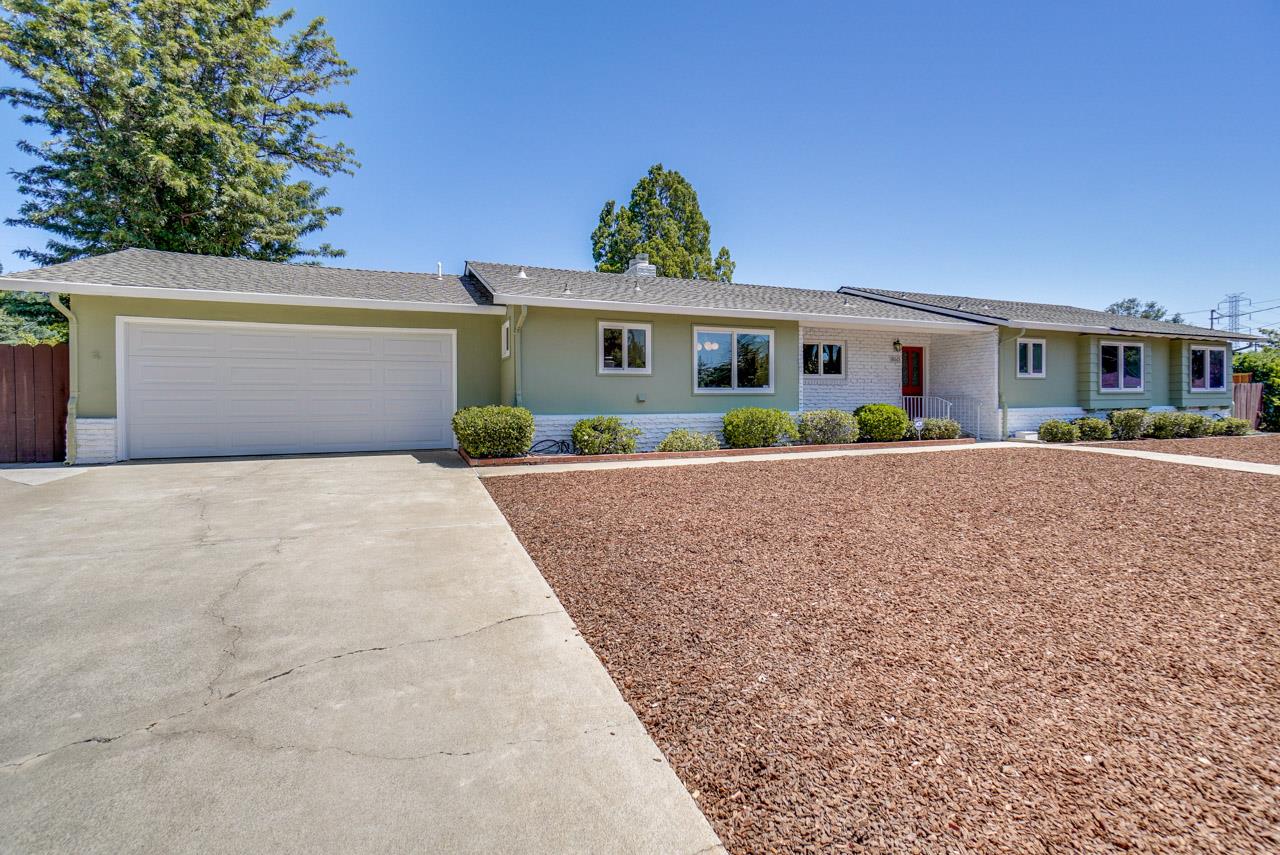 18665 Aspesi Drive Saratoga, CA 95070 - Photo 1 of 39 a front view of house with yard and green space