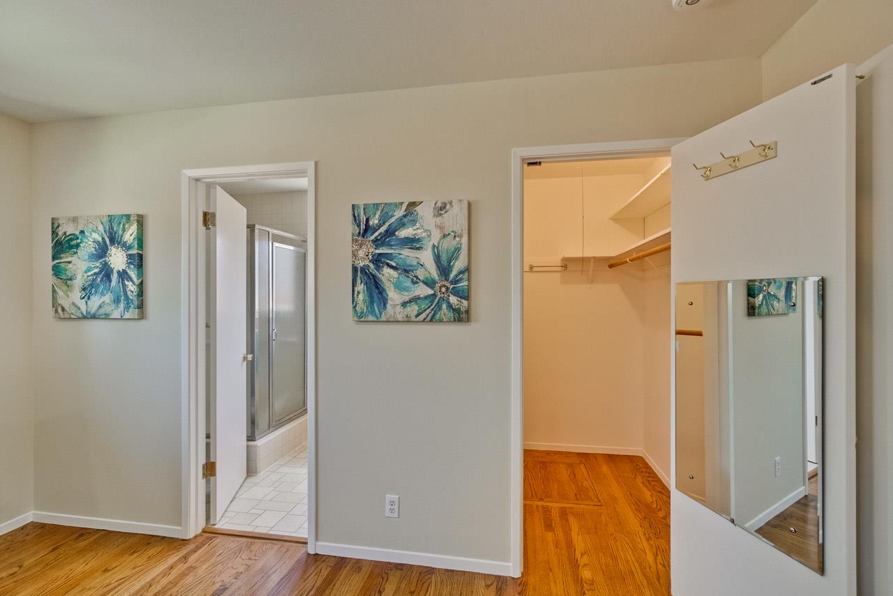 18665 Aspesi Drive Saratoga, CA 95070 - Photo 29 of 39 a view of a hallway with wooden floor and closet