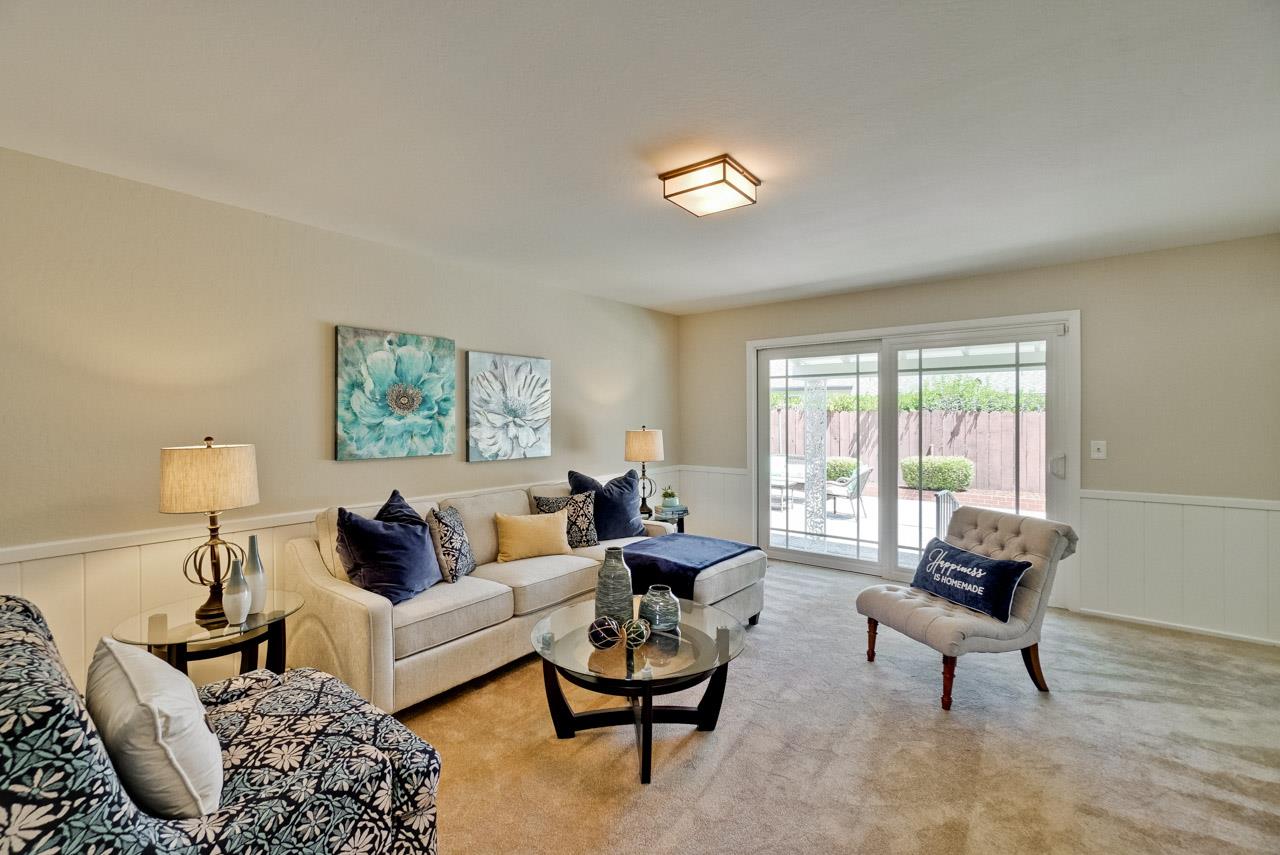 18665 Aspesi Drive Saratoga, CA 95070 - Photo 31 of 39 a living room with furniture and a window