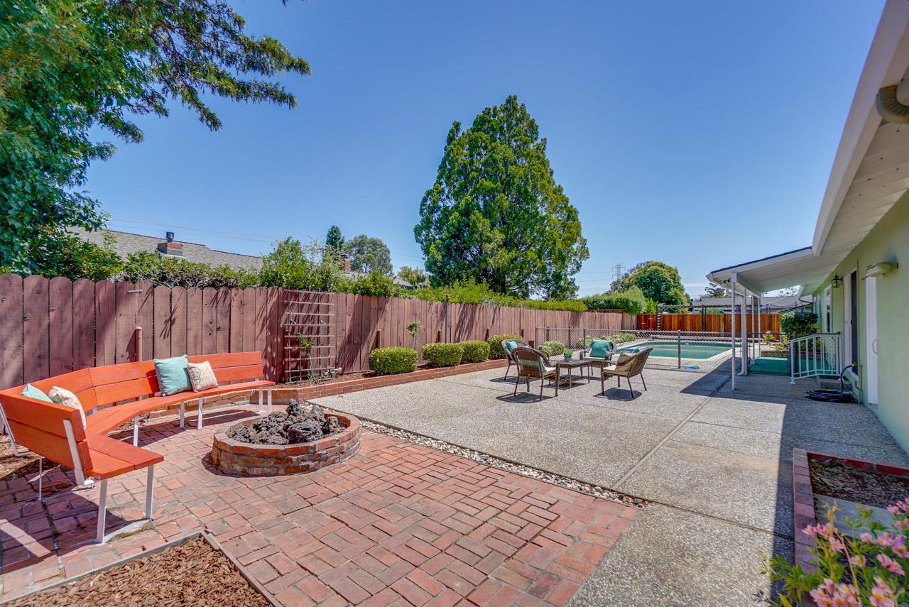 18665 Aspesi Drive Saratoga, CA 95070 - Photo 34 of 39 an outdoor space with patio and a garden