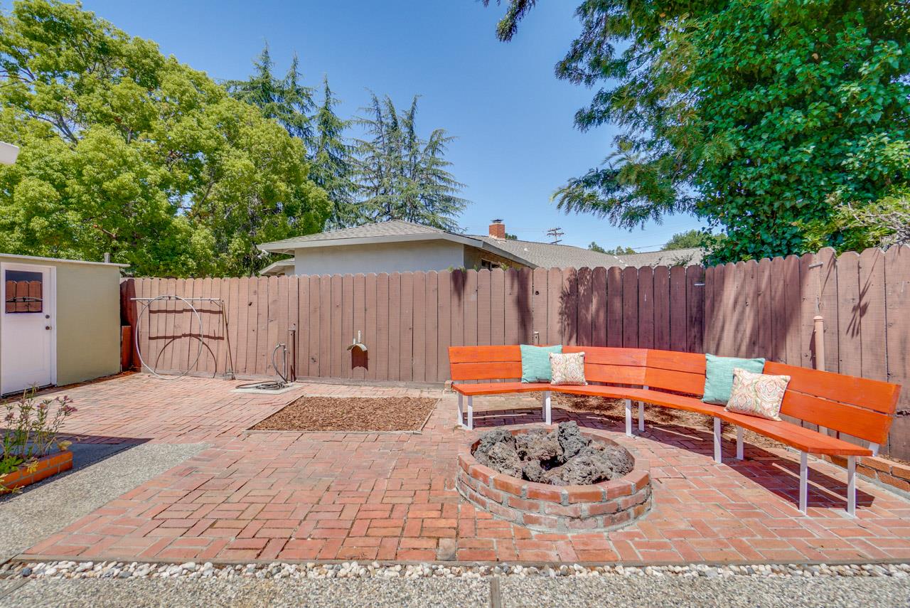 18665 Aspesi Drive Saratoga, CA 95070 - Photo 35 of 39 a backyard of a house with seating space