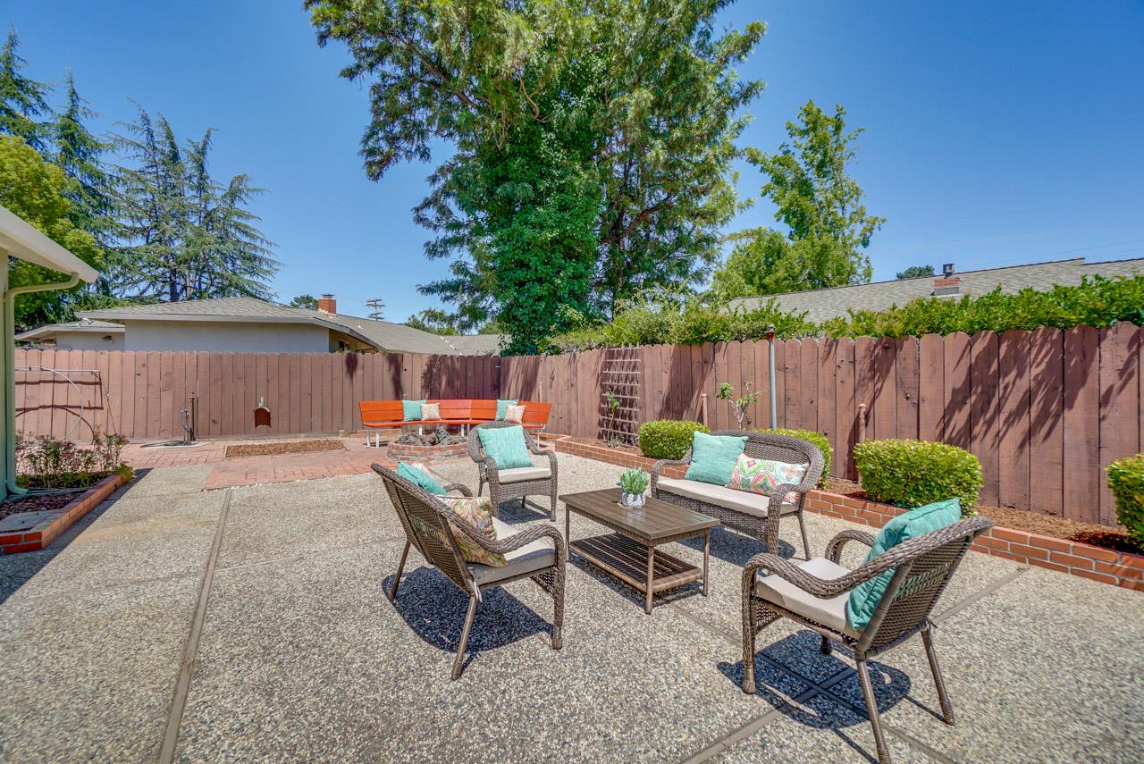 18665 Aspesi Drive Saratoga, CA 95070 - Photo 38 of 39 a view of backyard with outdoor seating and plants