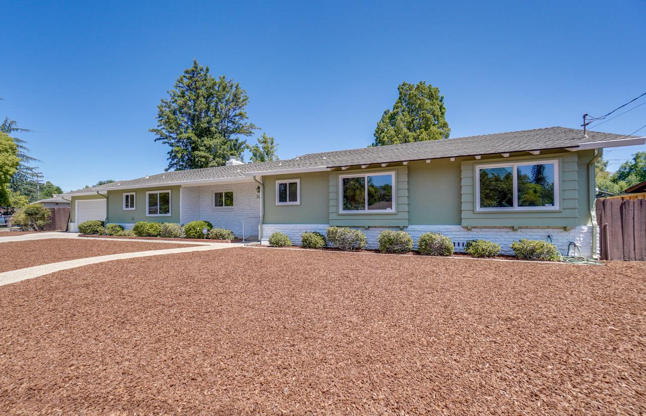 18665 Aspesi Drive Saratoga, CA 95070 - Photo 4 of 39 front view of a house with a yard