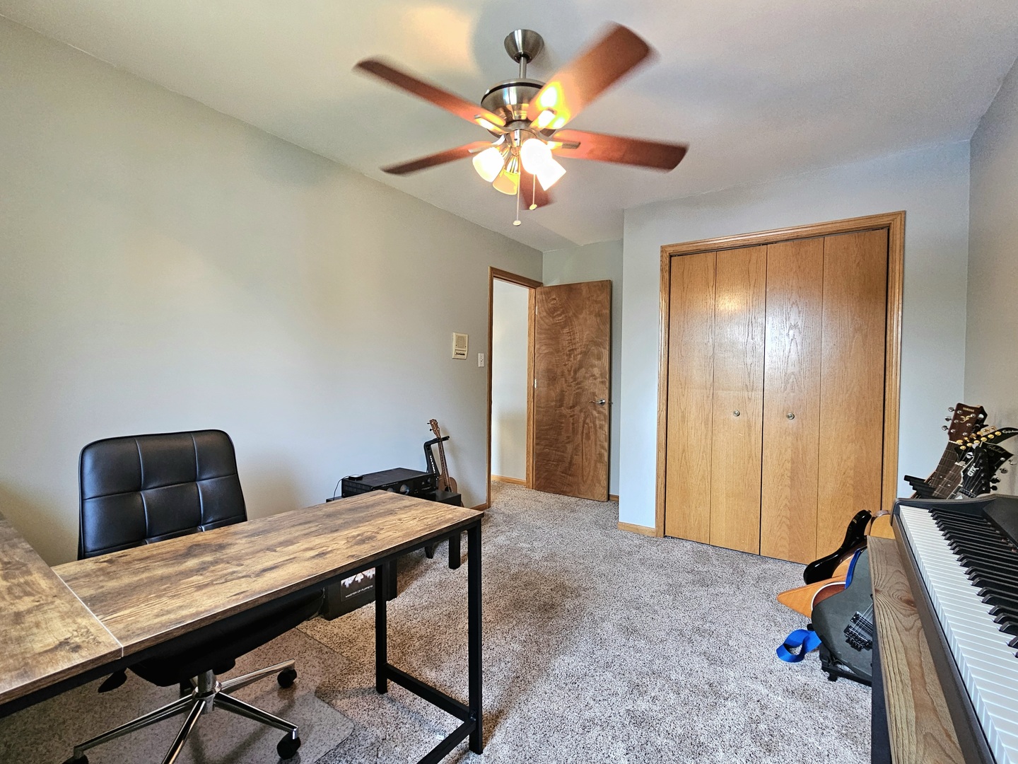 19451 Lancaster Drive Mokena, IL 60448 - Photo 12 of 32 a workspace with furniture and chandelier