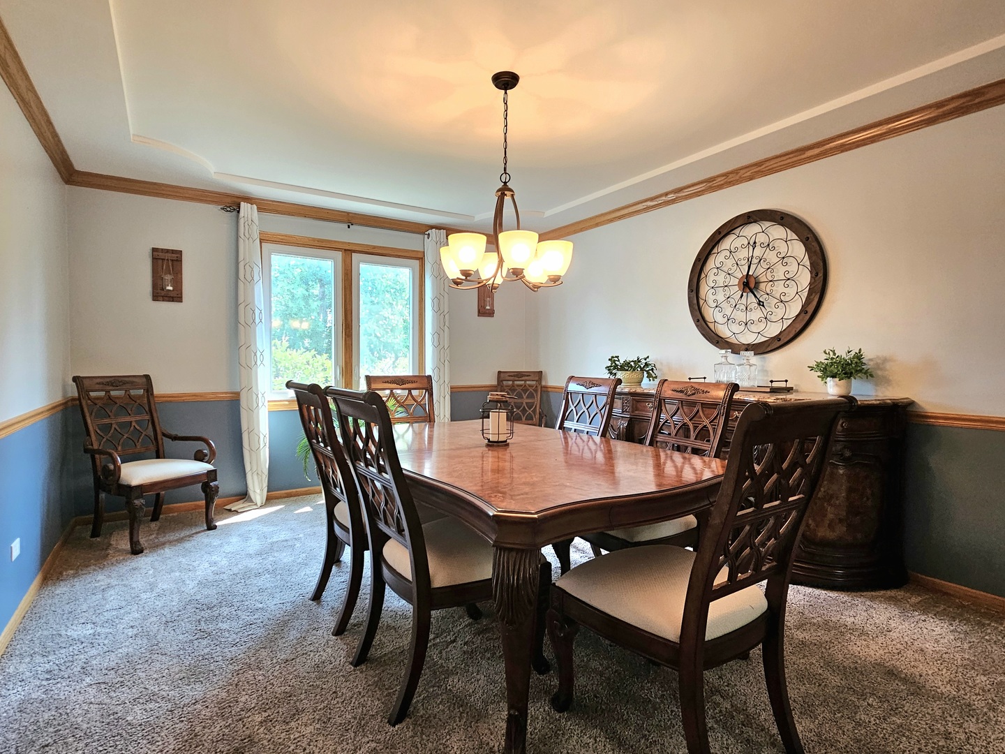 19451 Lancaster Drive Mokena, IL 60448 - Photo 13 of 32 a dining room with a wooden table and chairs