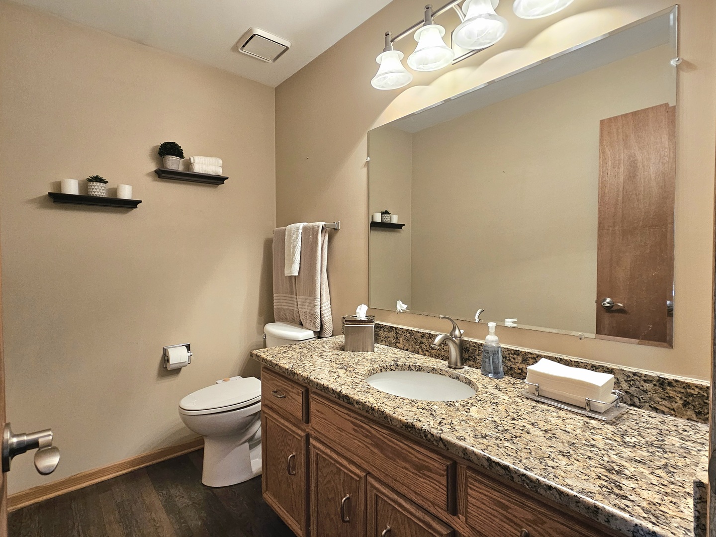 19451 Lancaster Drive Mokena, IL 60448 - Photo 16 of 32 a bathroom with a granite countertop sink a toilet and a mirror