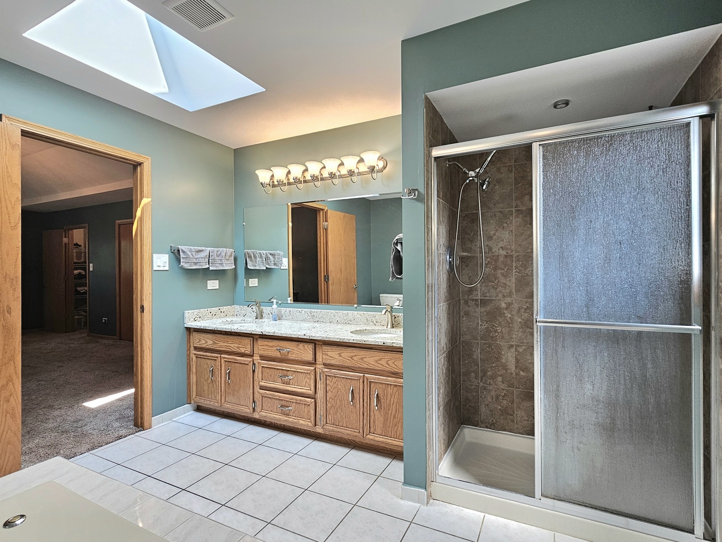 19451 Lancaster Drive Mokena, IL 60448 - Photo 20 of 32 a bathroom with a double vanity sink and a mirror