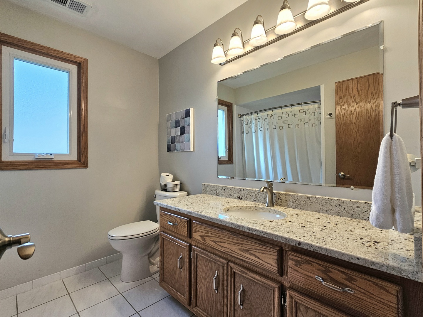 19451 Lancaster Drive Mokena, IL 60448 - Photo 24 of 32 a bathroom with a granite countertop sink and a mirror