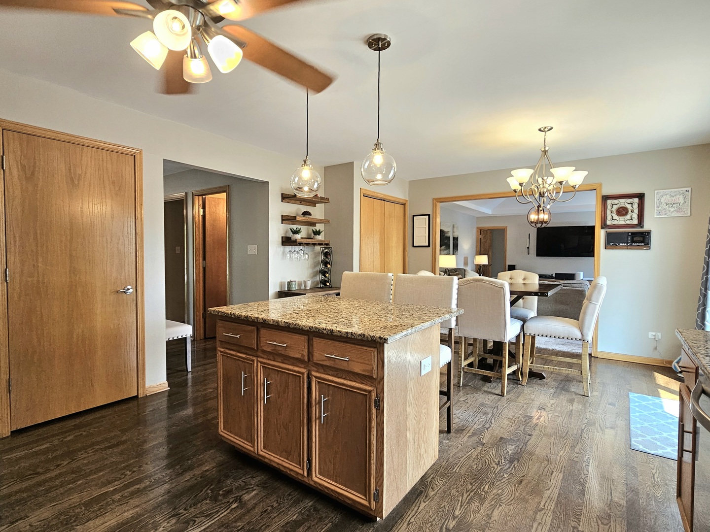 19451 Lancaster Drive Mokena, IL 60448 - Photo 6 of 32 a view of a dining room with furniture wooden floor and chandelier