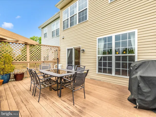 a bathroom with a sink toilet and a mirror