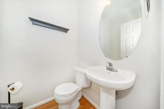 a bedroom with a bed couch and window