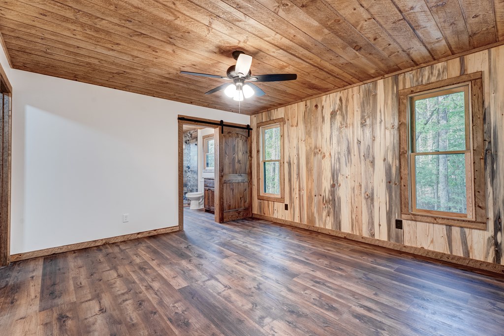 3448 Lickskillet Road Epworth, GA 30541 - Photo 12 of 71 a view of an empty room with a window
