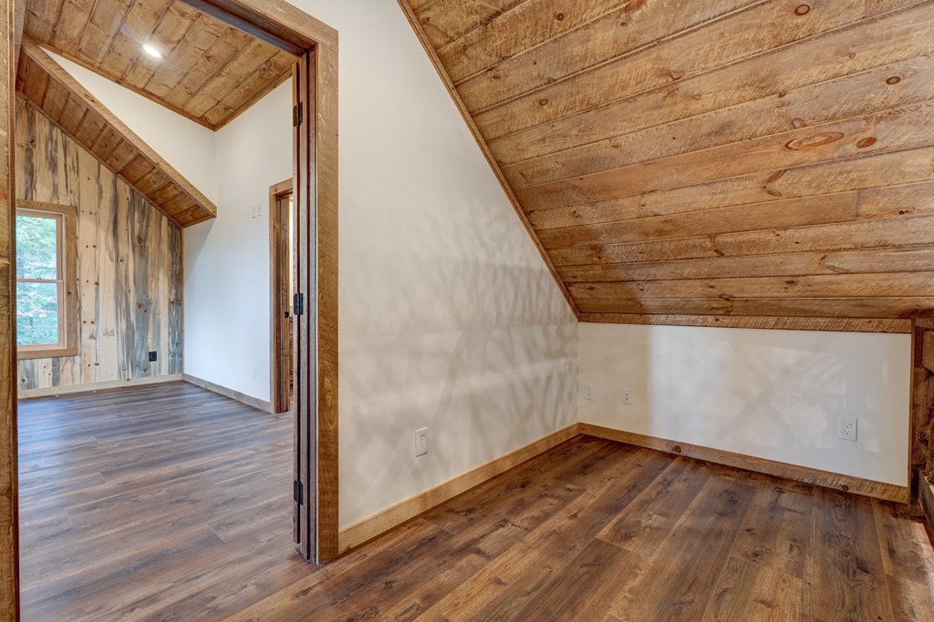 3448 Lickskillet Road Epworth, GA 30541 - Photo 26 of 71 a view of empty room with wooden floor