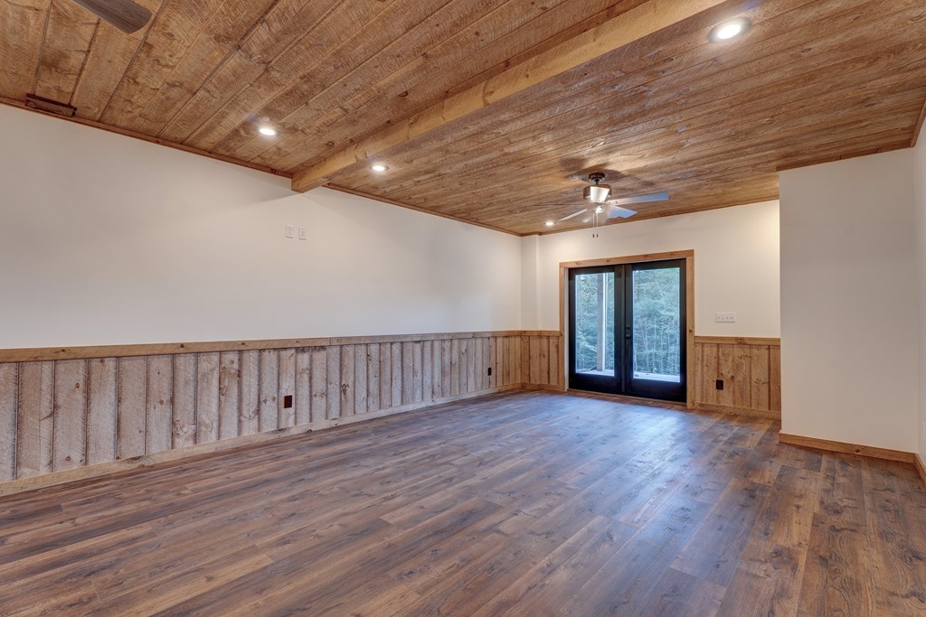 3448 Lickskillet Road Epworth, GA 30541 - Photo 38 of 71 a view of an empty room with wooden floor