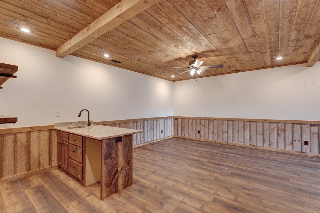 3448 Lickskillet Road Epworth, GA 30541 - Photo 39 of 71 a view of a hallway with wooden floor