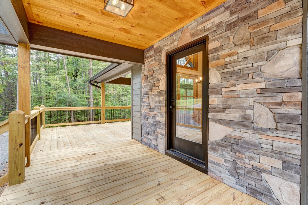 3448 Lickskillet Road Epworth, GA 30541 - Photo 52 of 71 a view of a balcony with wooden floor