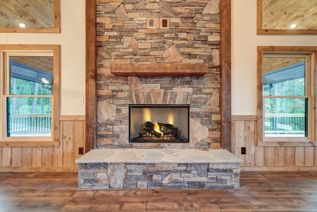 3448 Lickskillet Road Epworth, GA 30541 - Photo 8 of 71 a living room with a fireplace