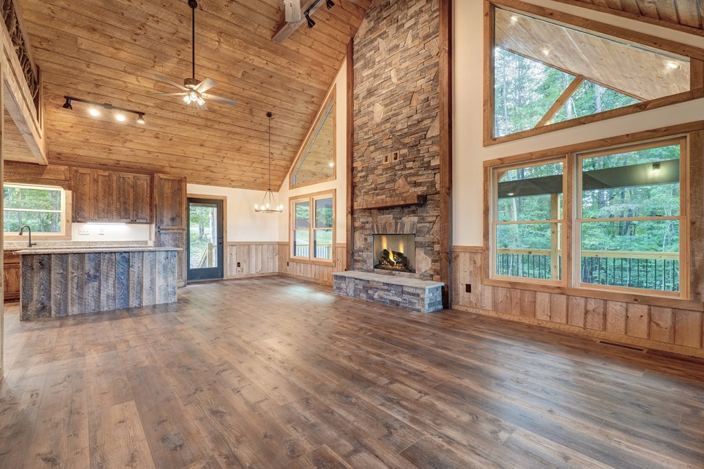 3448 Lickskillet Road Epworth, GA 30541 - Photo 9 of 71 a view of a room with wooden floor and iron stairs