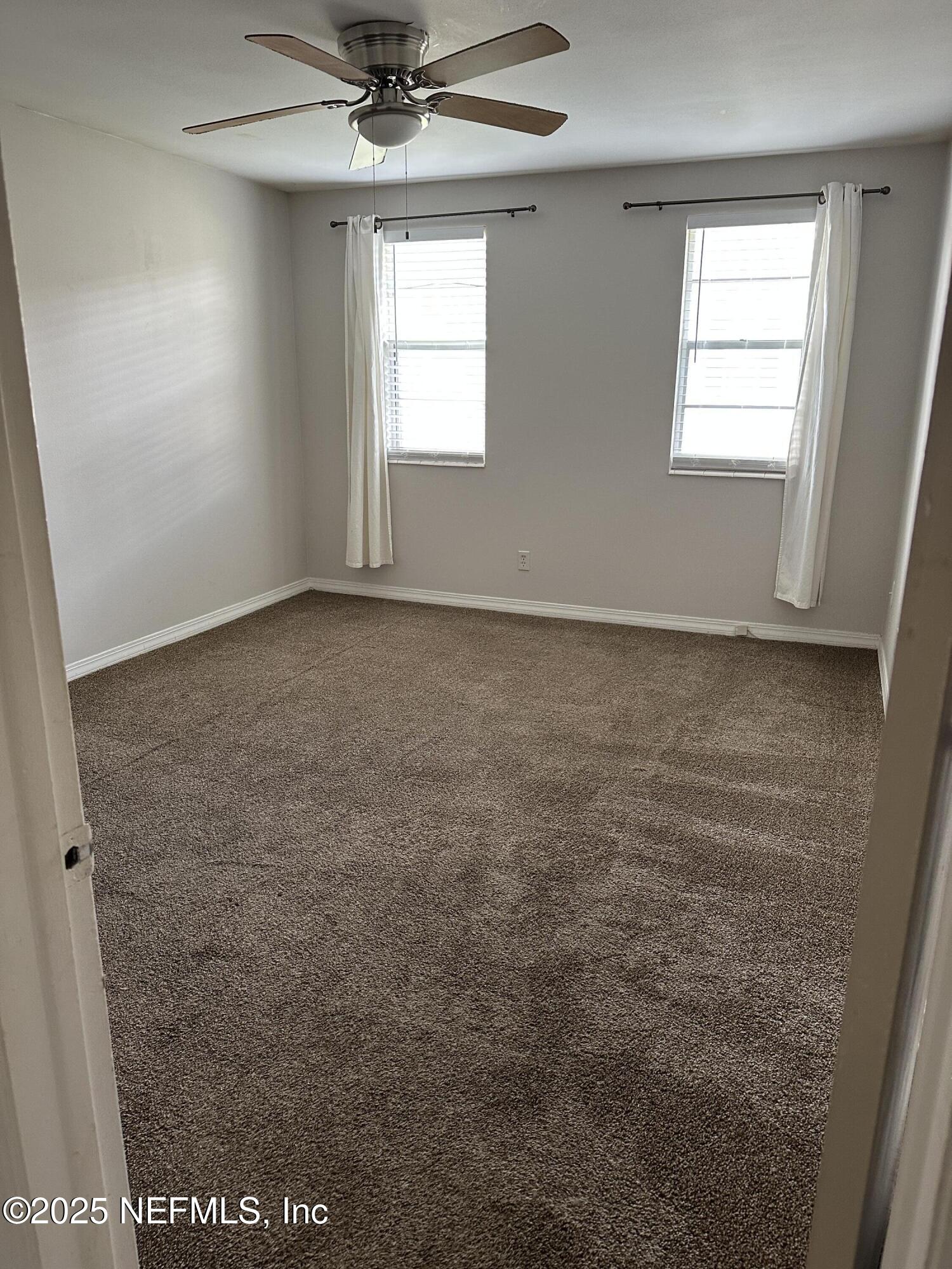 1756 El Prado Road, Unit 3 Jacksonville, FL 32216 - Photo 12 of 23 a view of an empty room and window