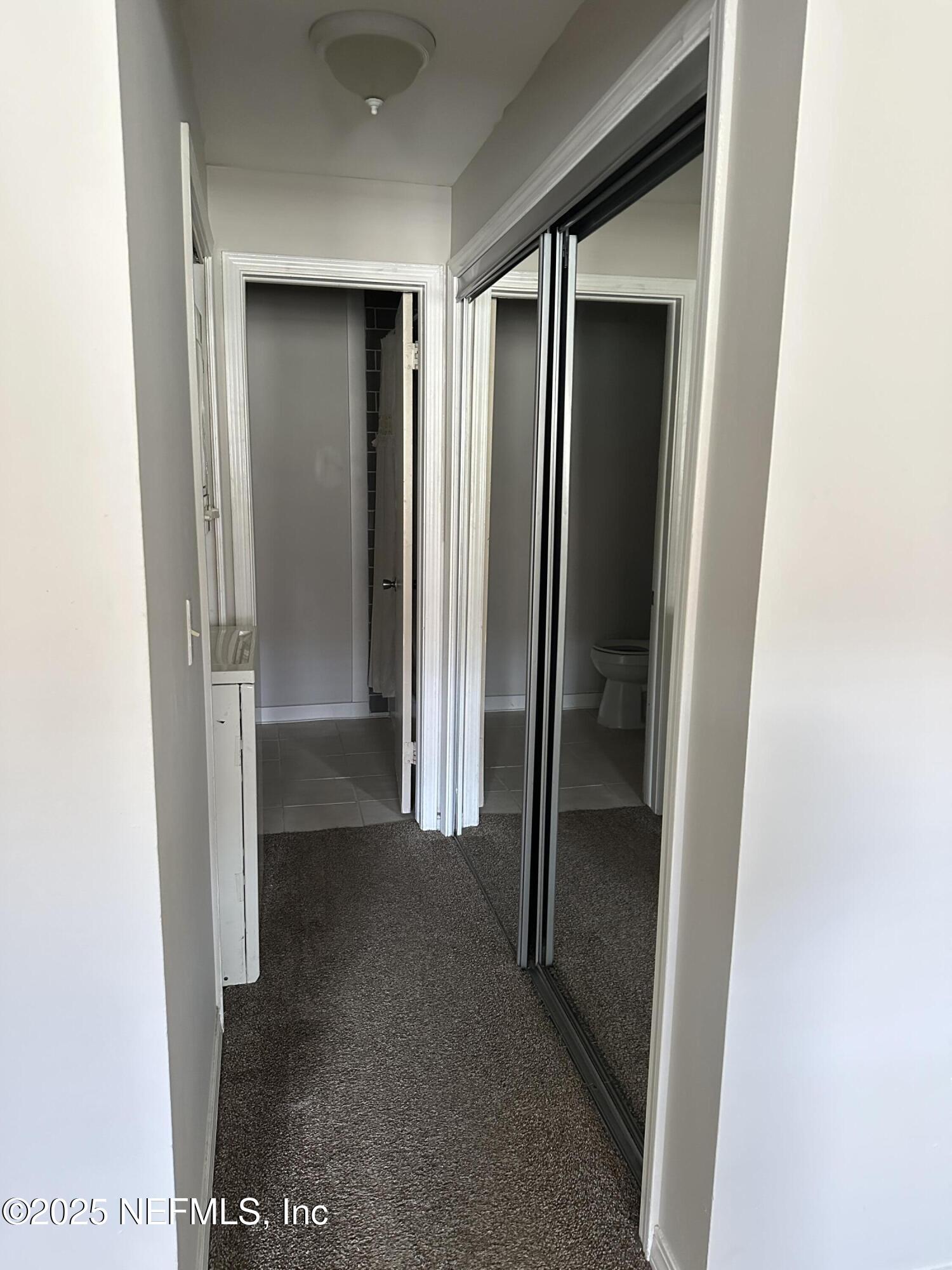 1756 El Prado Road, Unit 3 Jacksonville, FL 32216 - Photo 13 of 23 a view of closet area