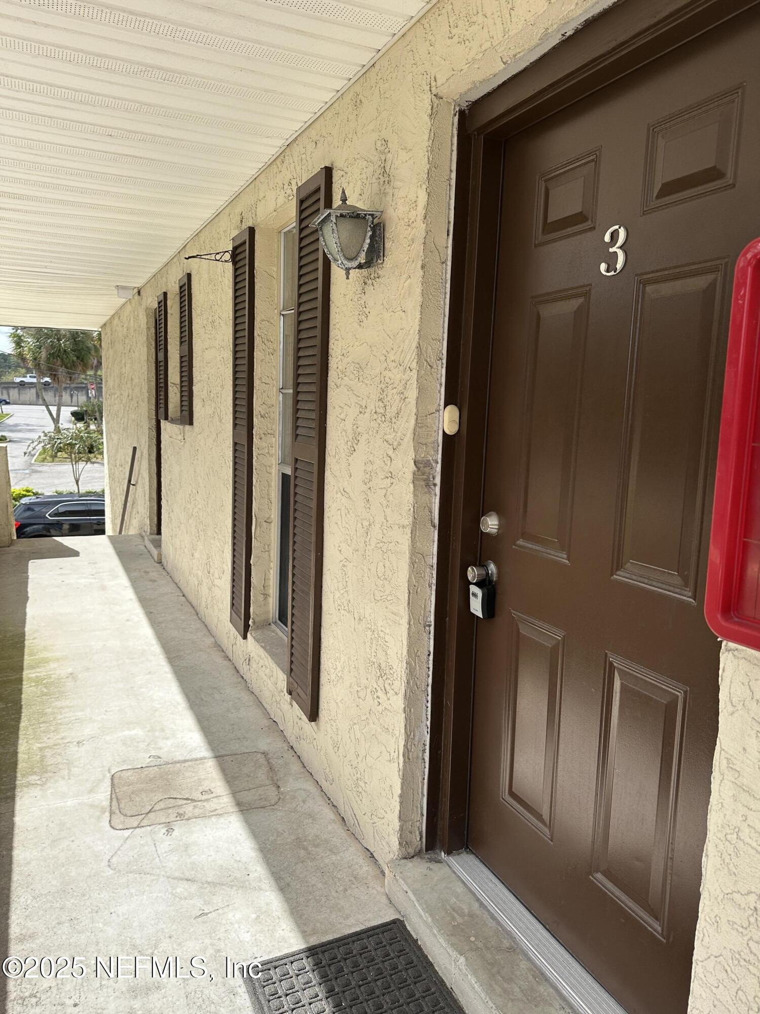 1756 El Prado Road, Unit 3 Jacksonville, FL 32216 - Photo 18 of 23 a view of a hallway with wooden floor