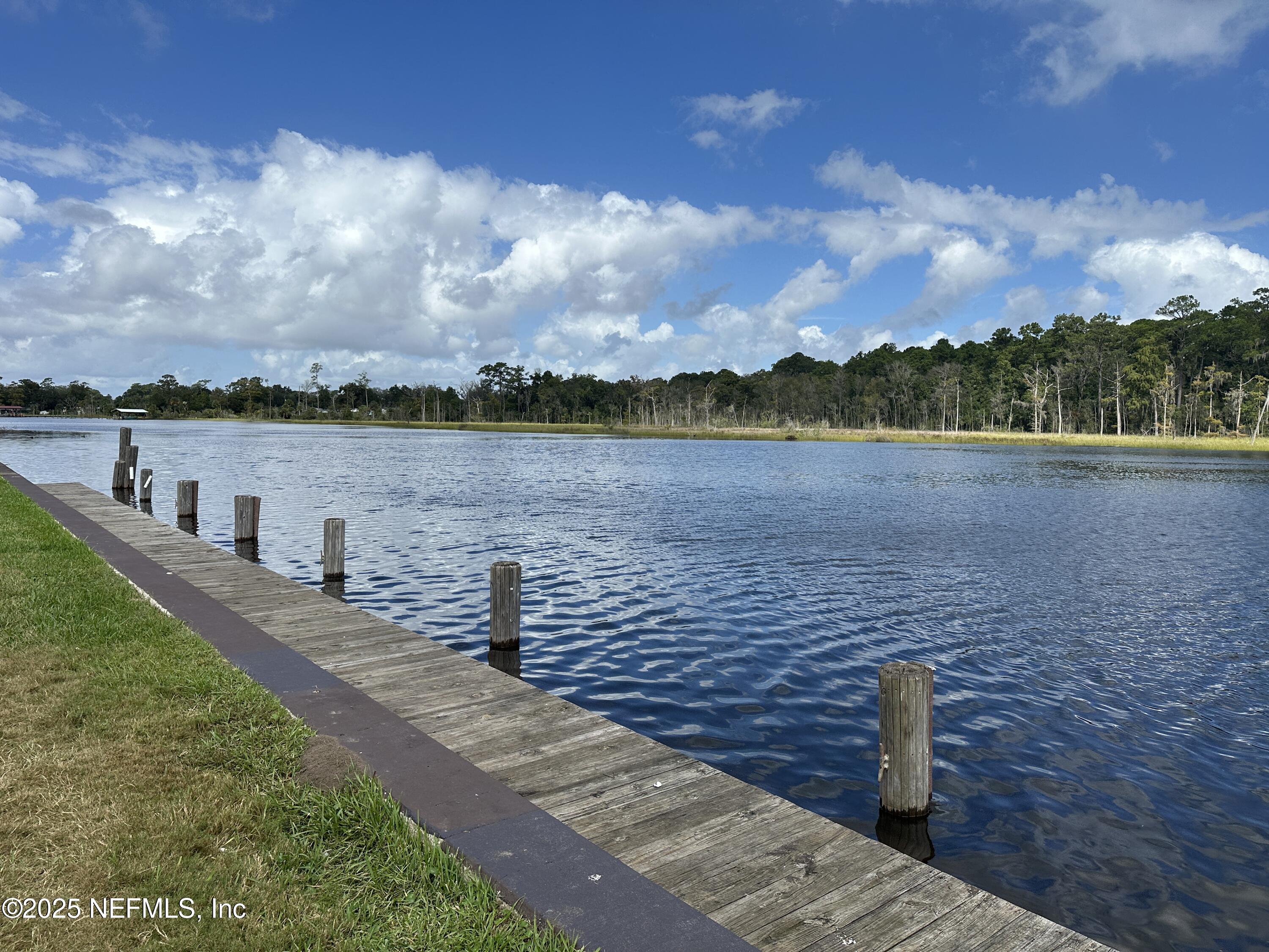 1756 El Prado Road, Unit 3 Jacksonville, FL 32216 - Photo 20 of 23 a view of a lake with a lake