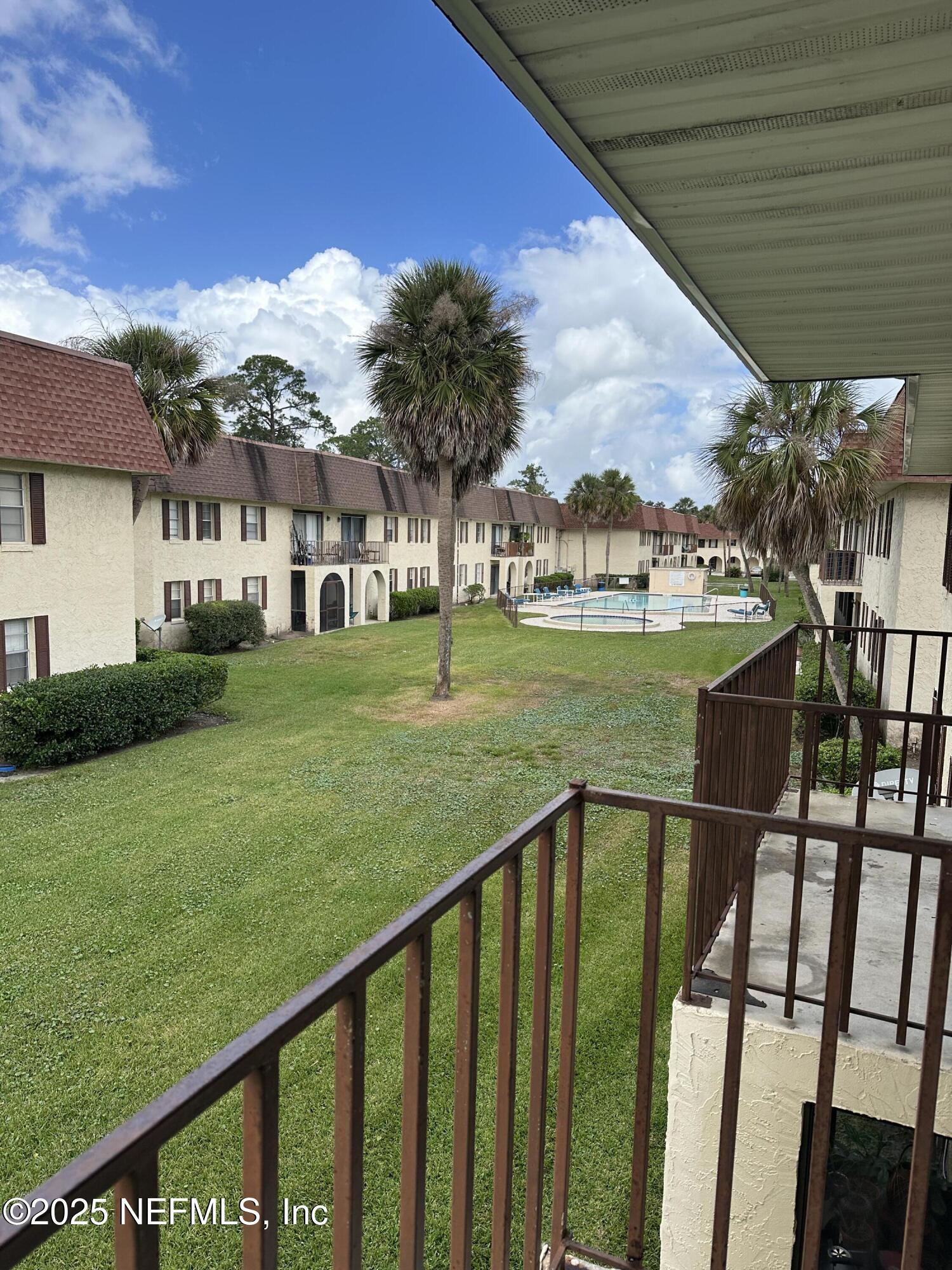 1756 El Prado Road, Unit 3 Jacksonville, FL 32216 - Photo 6 of 23 a view of a house with a yard