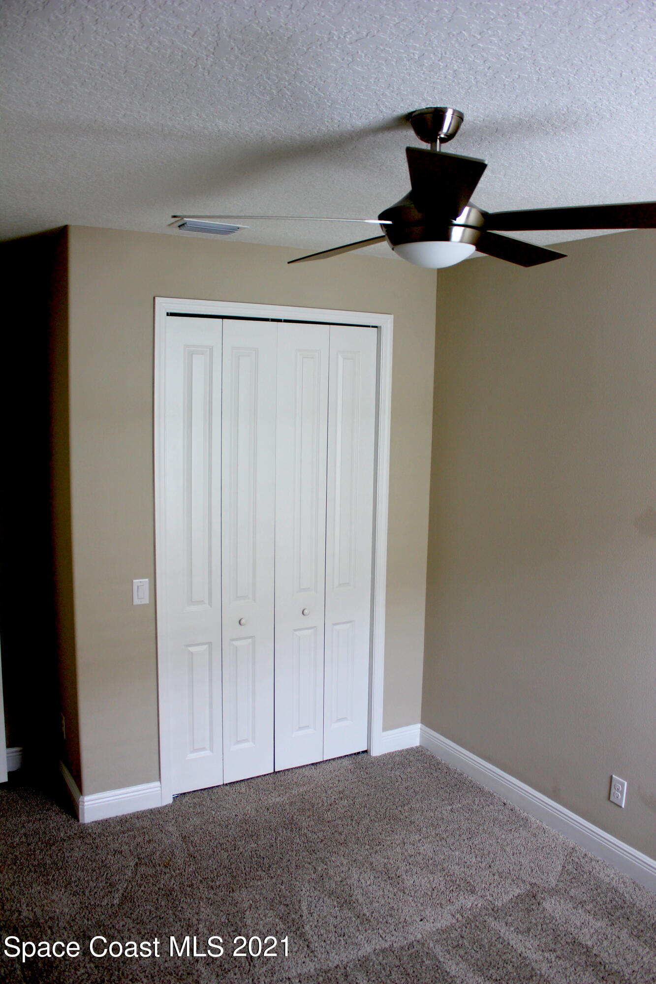 3630 Stabane Place Melbourne, FL 32940 - Photo 14 of 24 a view of room with an empty space and a window