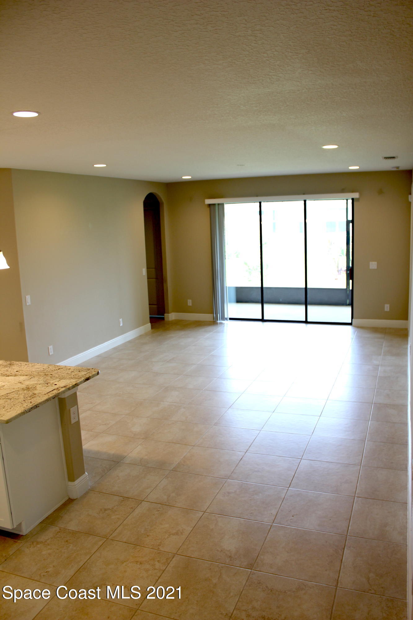3630 Stabane Place Melbourne, FL 32940 - Photo 4 of 24 a view of an empty room with a window