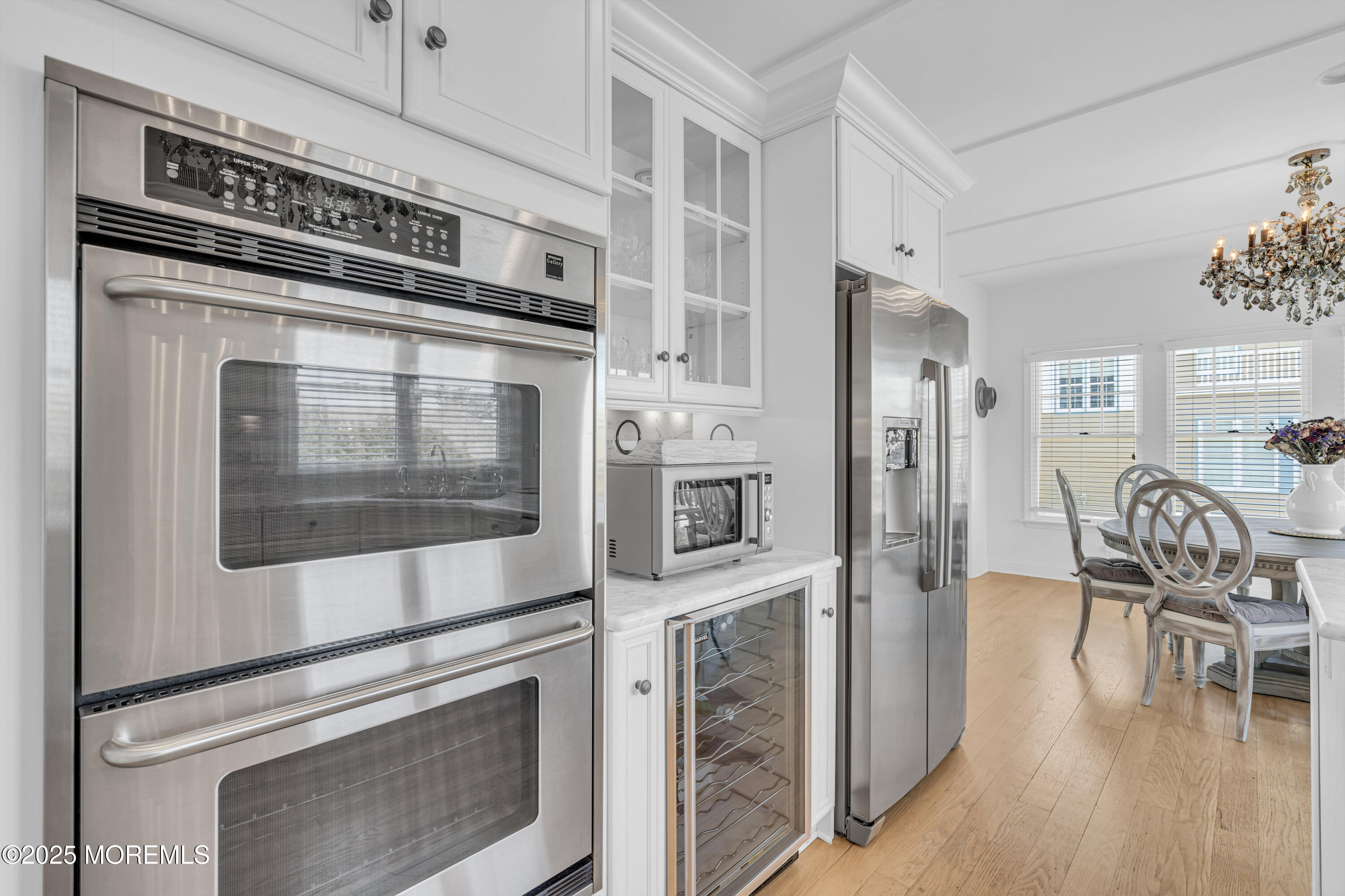 809 North Ocean Avenue Seaside Park, NJ 08752 - Photo 21 of 85 a kitchen with stainless steel appliances granite countertop a stove top oven and a refrigerator