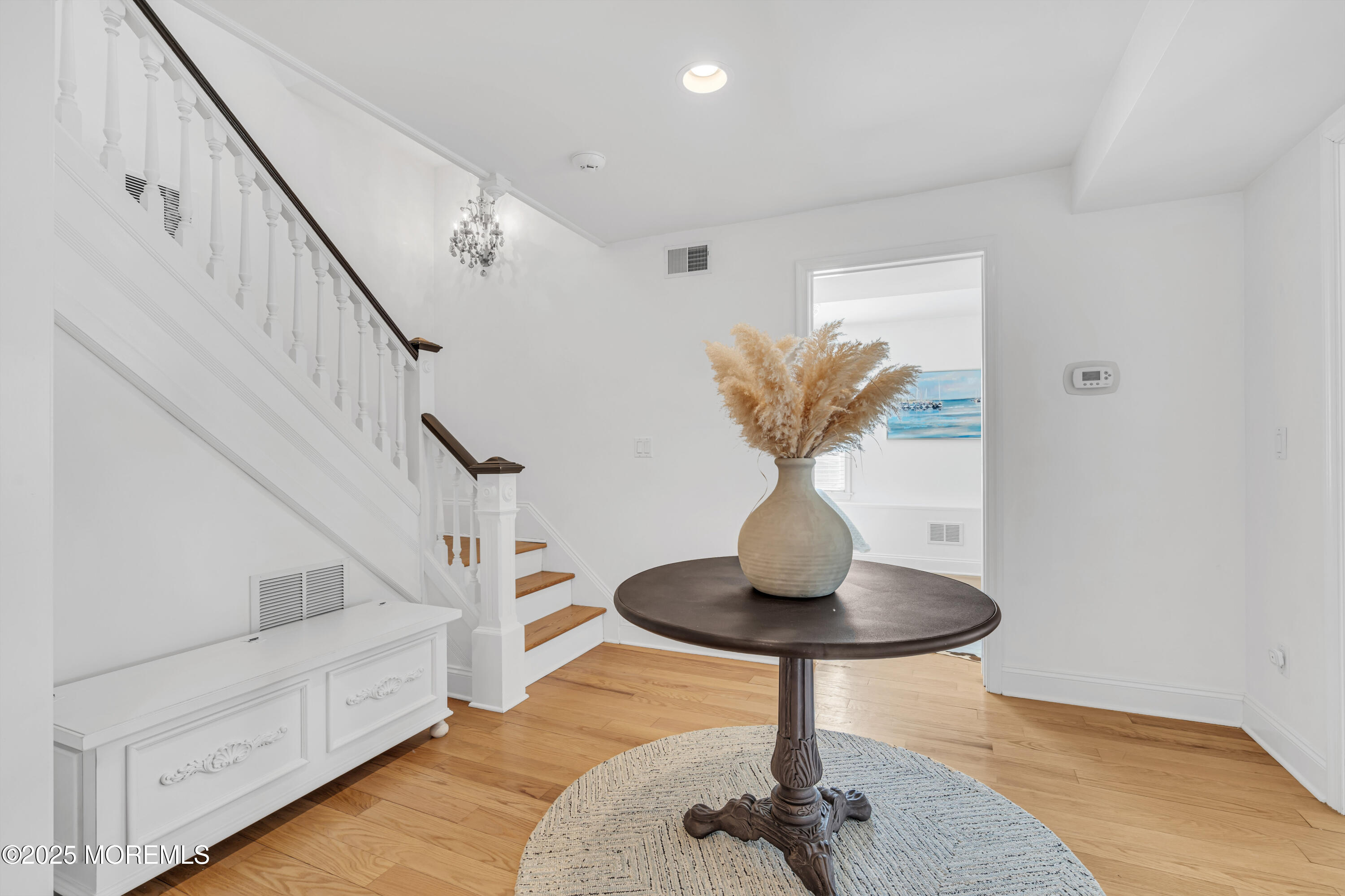 809 North Ocean Avenue Seaside Park, NJ 08752 - Photo 27 of 85 a view of entryway and hall with wooden floor