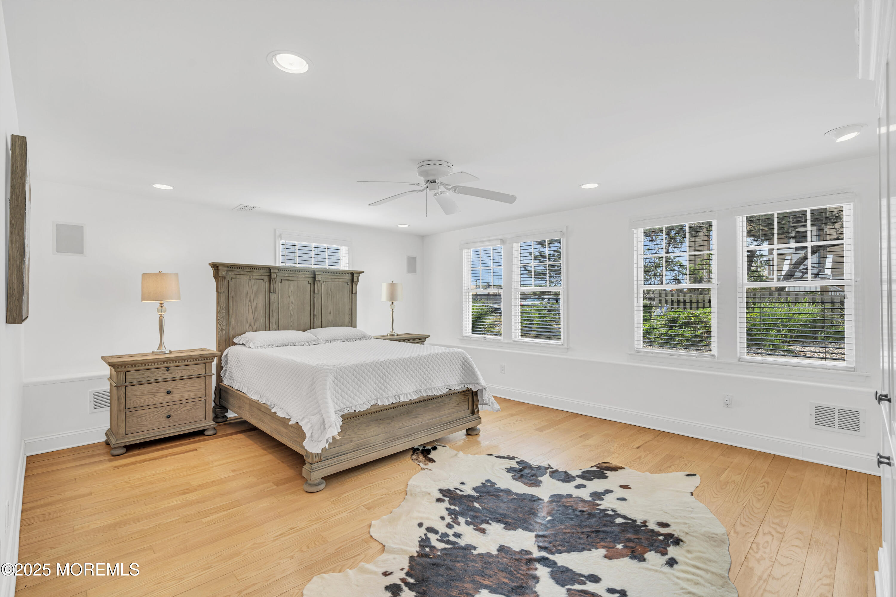 809 North Ocean Avenue Seaside Park, NJ 08752 - Photo 33 of 85 a bed sitting in a spacious bedroom next to a window