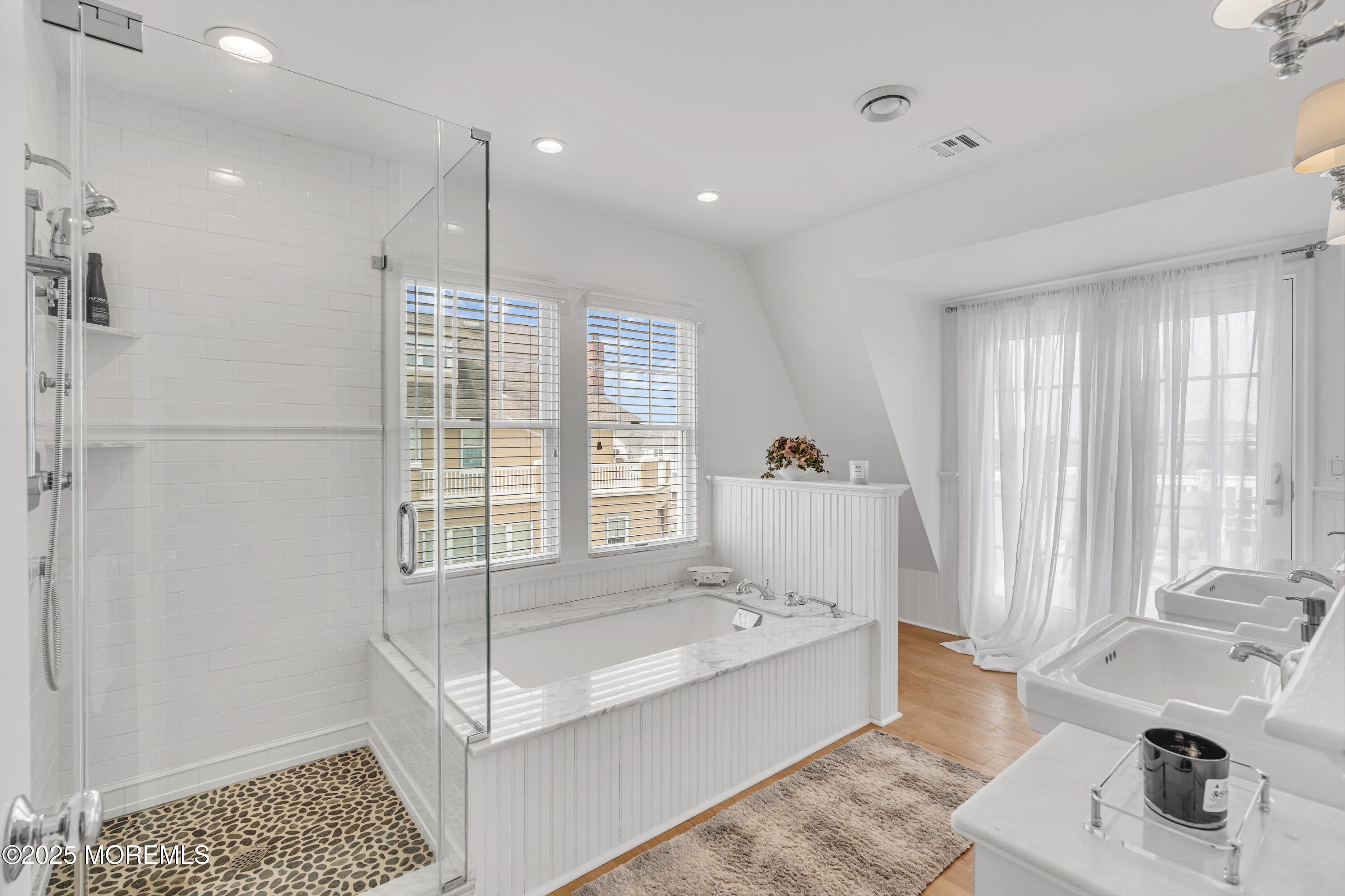 809 North Ocean Avenue Seaside Park, NJ 08752 - Photo 44 of 85 a spacious bedroom with a bed and a window