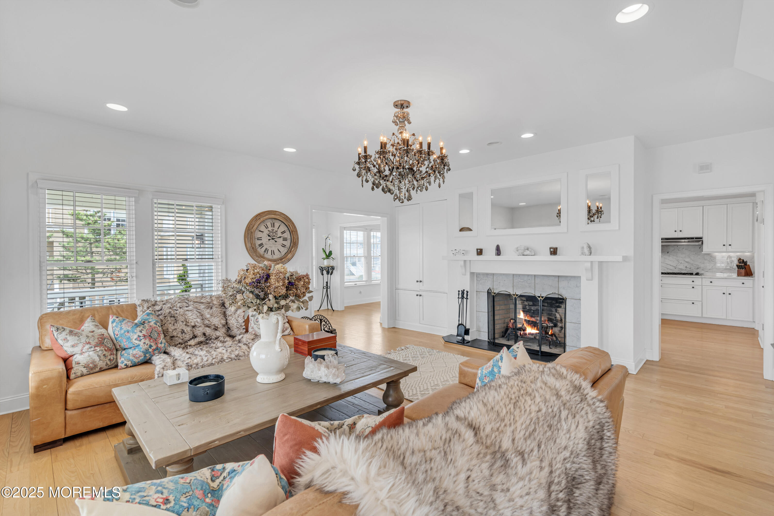809 North Ocean Avenue Seaside Park, NJ 08752 - Photo 54 of 85 a living room with furniture a fireplace and a large window