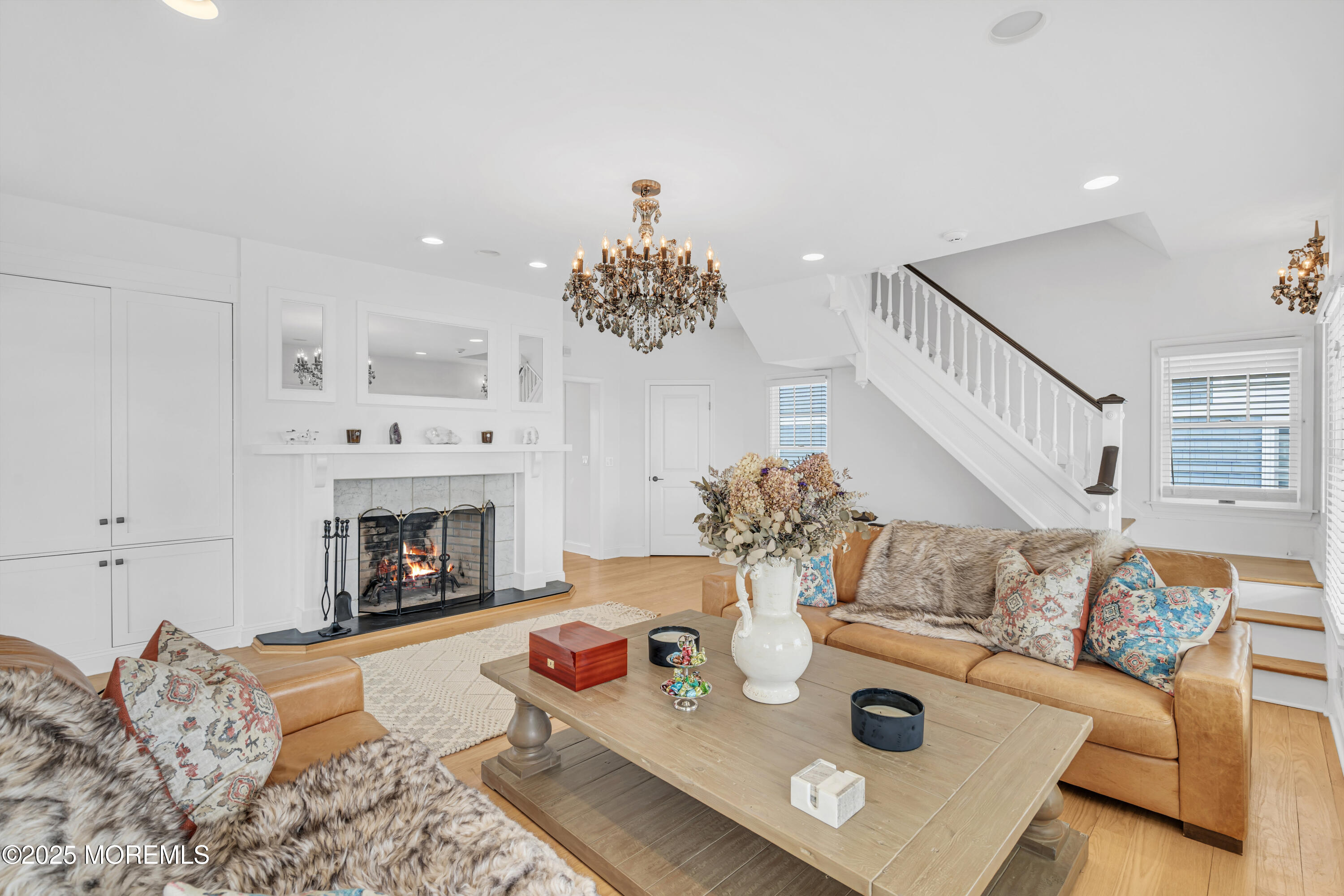 809 North Ocean Avenue Seaside Park, NJ 08752 - Photo 60 of 85 a living room with furniture and a fireplace