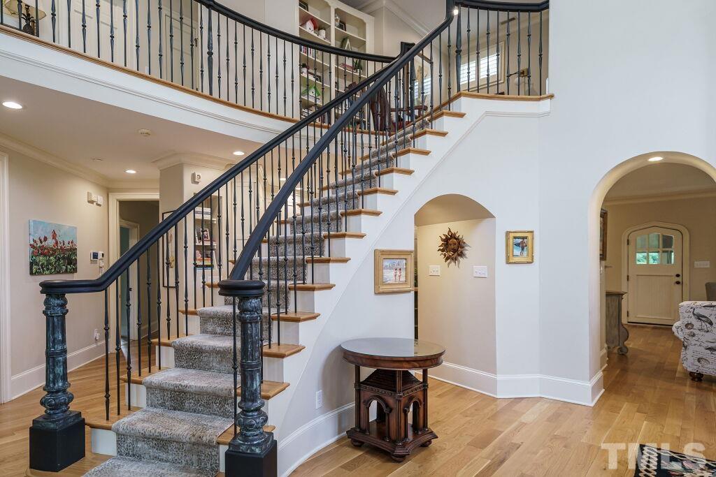 1833 Torrington Street Raleigh, NC 27615 - Photo 11 of 44 a view of entryway and hall with wooden floor