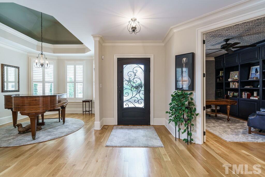 1833 Torrington Street Raleigh, NC 27615 - Photo 4 of 44 a lobby with furniture and window