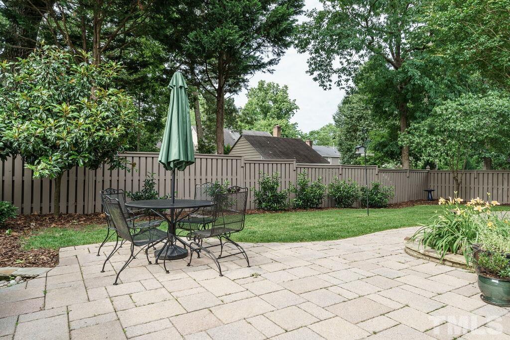 1833 Torrington Street Raleigh, NC 27615 - Photo 44 of 44 a view of chair and table in the garden
