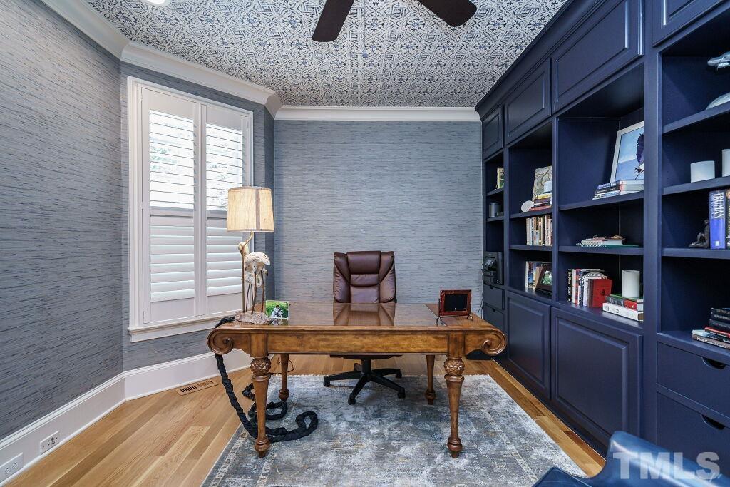 1833 Torrington Street Raleigh, NC 27615 - Photo 7 of 44 a view of a workspace with furniture