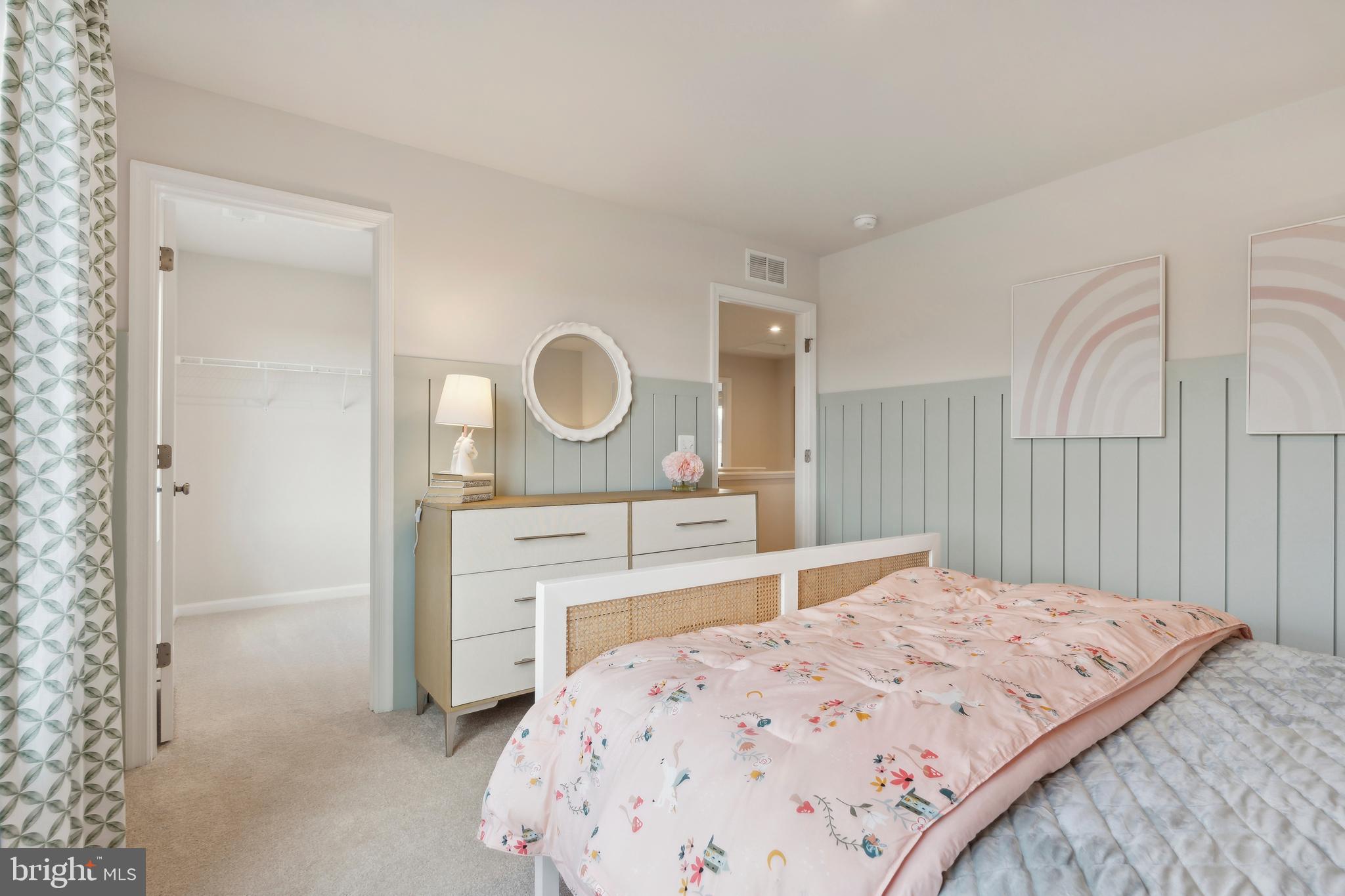 105 Fortuna Road Charles Town, WV 25414 - Photo 29 of 32 a bedroom with a bed and a dresser