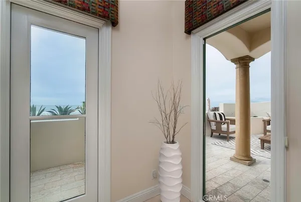a bathroom with a toilet a sink and a window