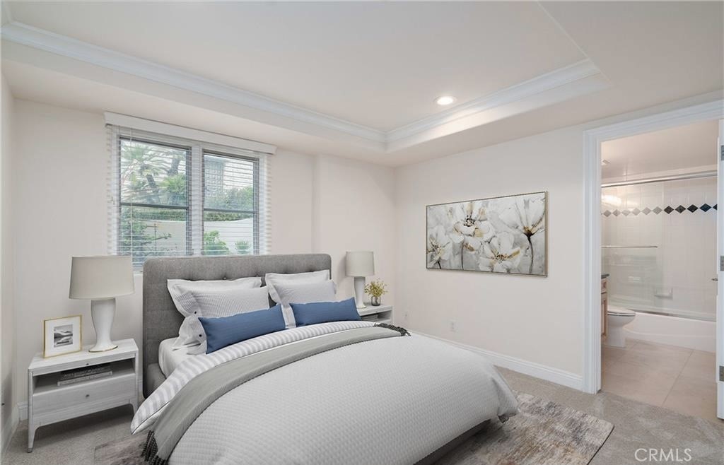 2420 The Strand Manhattan Beach, CA 90266 - Photo 30 of 42 a bedroom with a large bed and a window