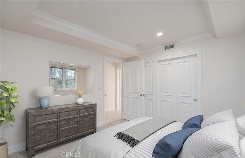 2420 The Strand Manhattan Beach, CA 90266 - Photo 32 of 42 a bedroom with a bed and window