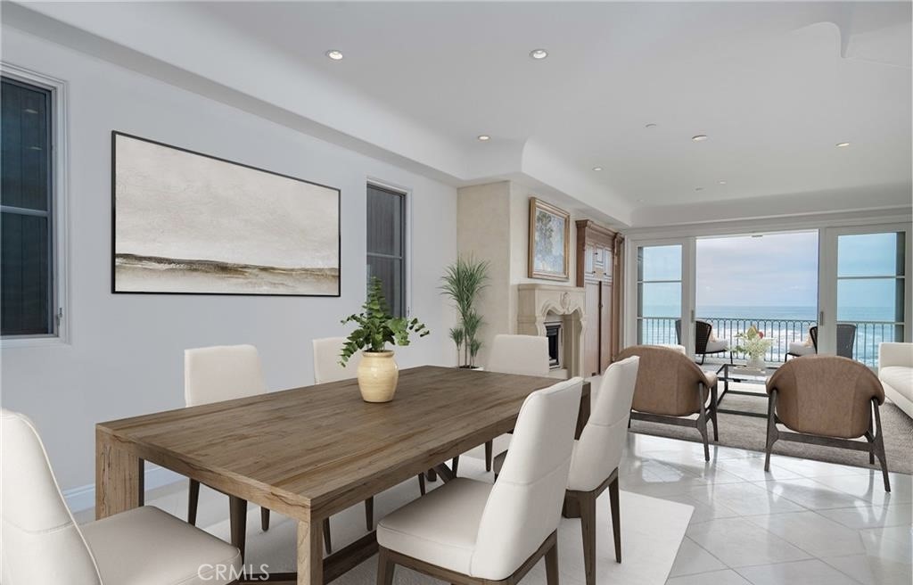 2420 The Strand Manhattan Beach, CA 90266 - Photo 10 of 42 a view of a dining room with furniture window and wooden floor