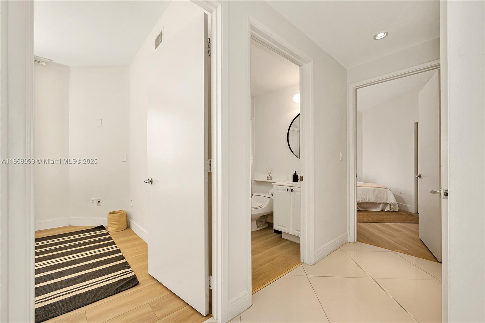 Village of Key Biscayne Key Biscayne, FL 33149 - Photo 11 of 24 a bathroom with a sink and a mirror